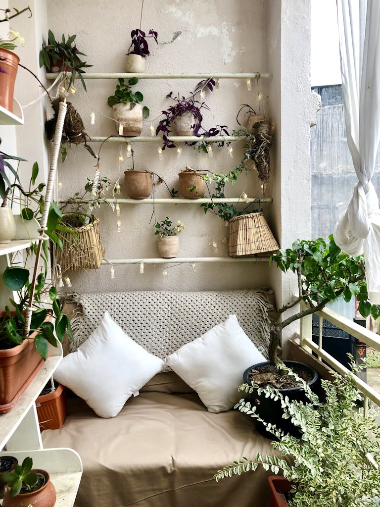 An Indoor Vertical Garden with Plants on Shelves and Ground Level